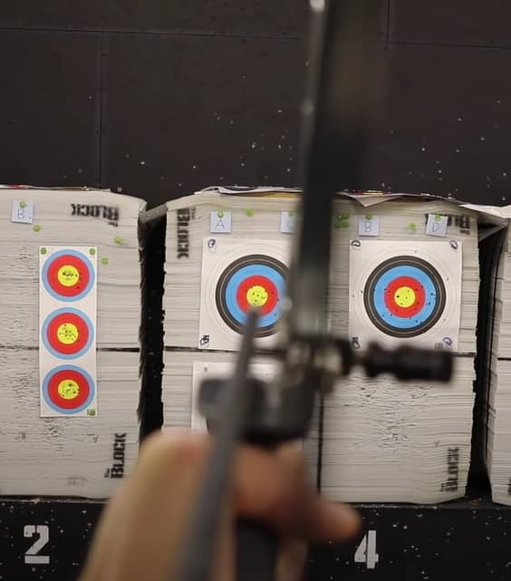 For the string walking aim, place the point of the arrow on the target. 