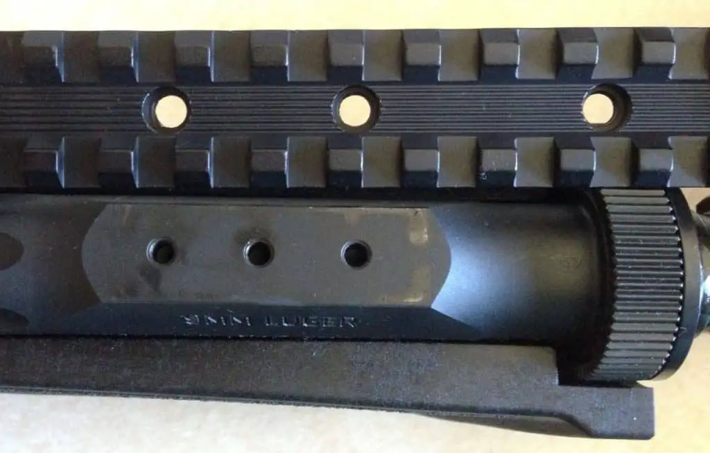 Scope mounting holes on a rifle
