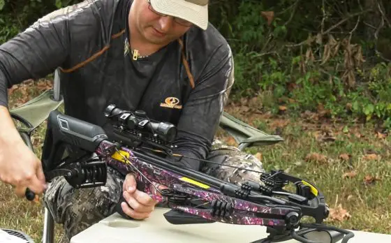 Cock A Crossbow With Cranking Device